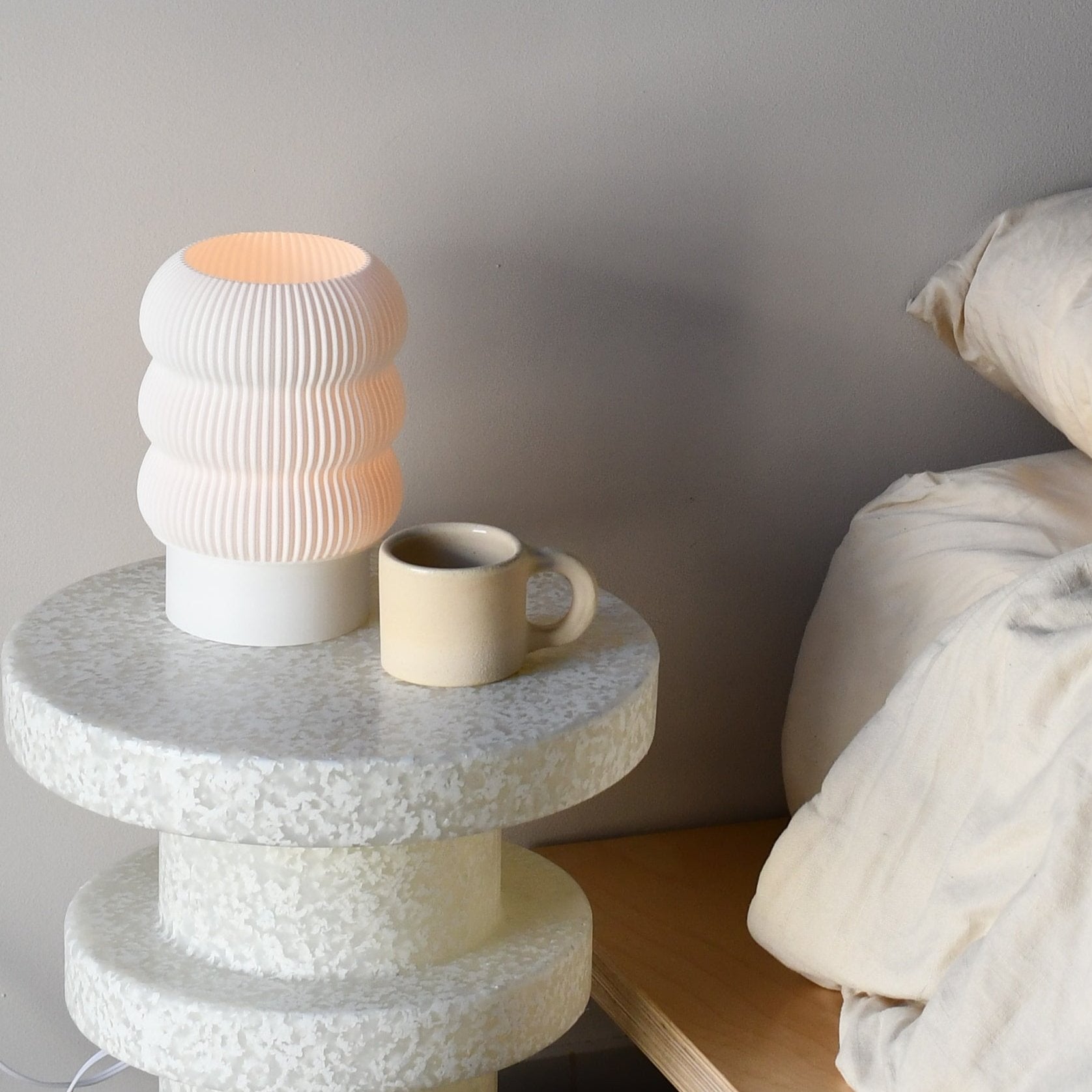 Lola Lamp in Cream – sculptural table lamp with soft curves and matte finish
Cream table lamp with organic silhouette and smooth texture
Soft white lamp for modern interior spaces